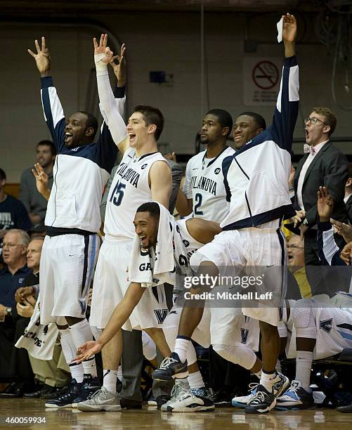 JayVaughn Pinkston, Ryan Arcidiacono, Darrun Hilliard, Kris Jenkins, and Dylan Ennis of the Villanova Wildcats react after a made basket in the final...