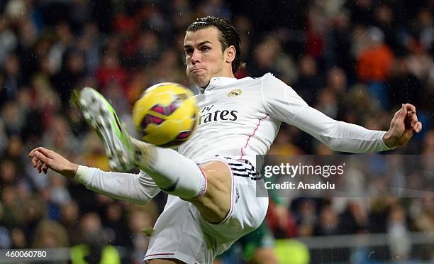 Bale of Real Madrid in actipn during the Spanish La Liga soccer match between Real Madrid and RC Celta at the Santiago Bernabeu stadium in Madrid,...