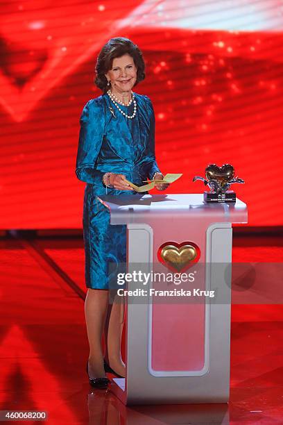 Queen Silvia of Sweden attends the Ein Herz Fuer Kinder Gala 2014 - Show on December 6, 2014 in Berlin, Germany.