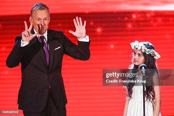 Johannes B. Kerner and Angelina Jordan attend the Ein Herz Fuer Kinder Gala 2014 - Show on December 6, 2014 in Berlin, Germany.