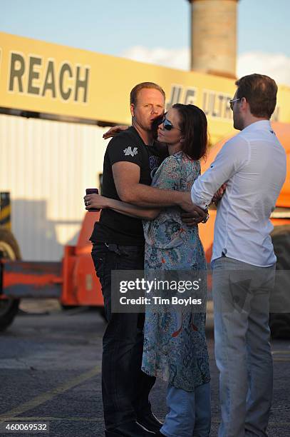 Nik Wallenda kisses his wife Erendira before walking a high wire over Sarasota Ford on December 6, 2014 in Sarasota, Florida.