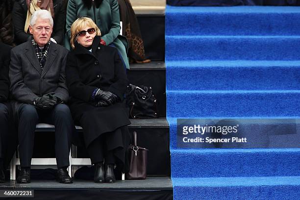 Hillary and Bill Clinton watch the ceremonies for New York City's 109th Mayor Bill de Blasio on January 1, 2014 in New York City. Mayor de Blasio was...