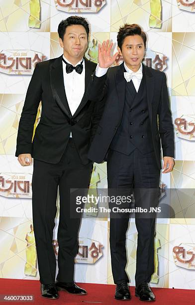 Kim Su-Ro and Kim Min-Jong arrive at the red carpet of the 2013 SBS drama awards at SBS Prism Tower on December 31, 2013 in Seoul, South Korea.