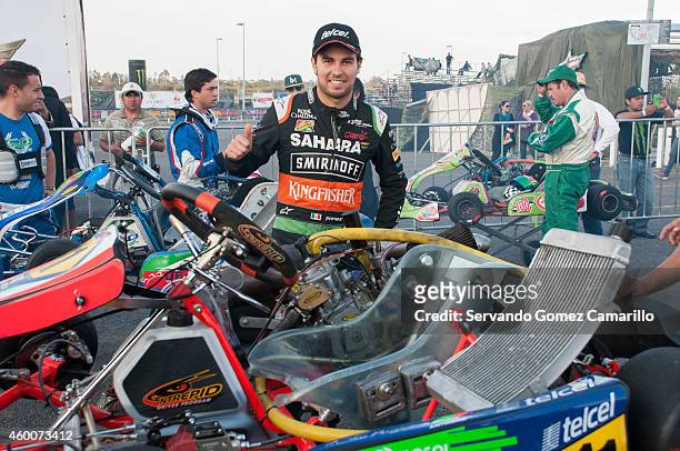 Mexican driver of Formula one Sergio "Checo" Pérez gets ready to participate in a race as part of the Grand Prix International Wings Army kart at...