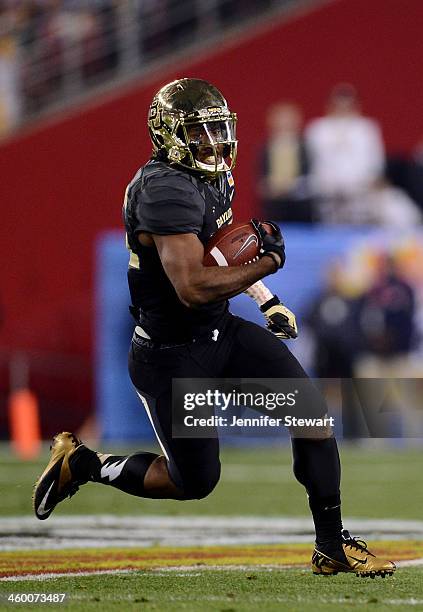 Running back Lache Seastrunk of the Baylor Bears carries the ball against the UCF Knights in the first quarter of the Tostitos Fiesta Bowl at...