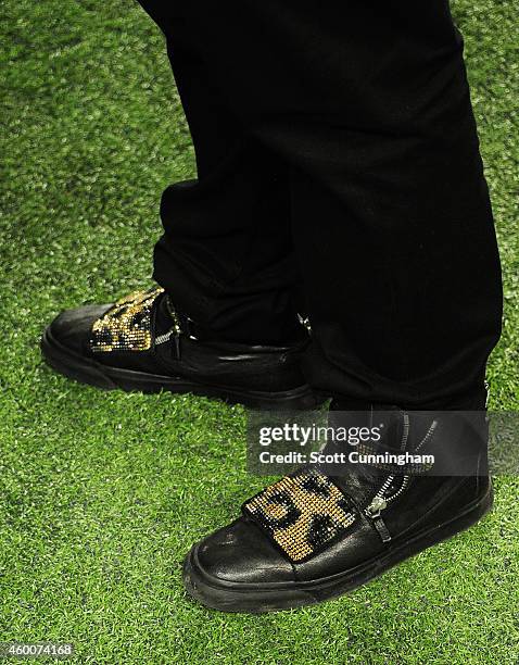 Shoe detail of Sean Weatherspoon of the Atlanta Falcons as he attends the SEC Championship game between the Alabama Crimson Tide and the Missouri...