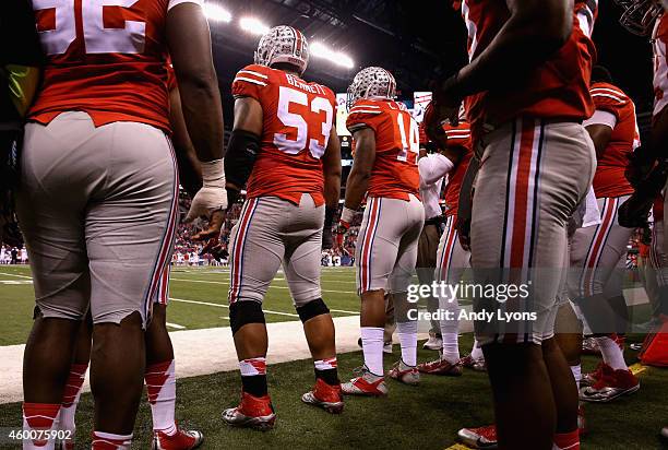 Defensive lineman Michael Bennett wears to honor late teammate Kosta Karageorge of the Ohio State Buckeyes during the Big Ten Championship against...
