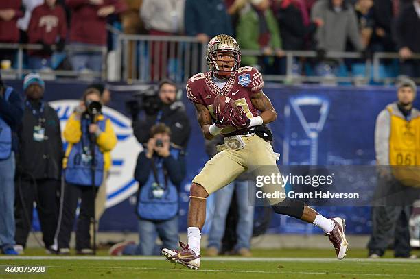 Rashad Greene of the Florida State Seminoles makes a touchdown catch against the Georgia Tech Yellow Jackets during the Atlantic Coast Conference...