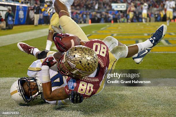 Rashad Greene of the Florida State Seminoles makes a touchdown catch against Jamal Golden of the Georgia Tech Yellow Jackets during the Atlantic...