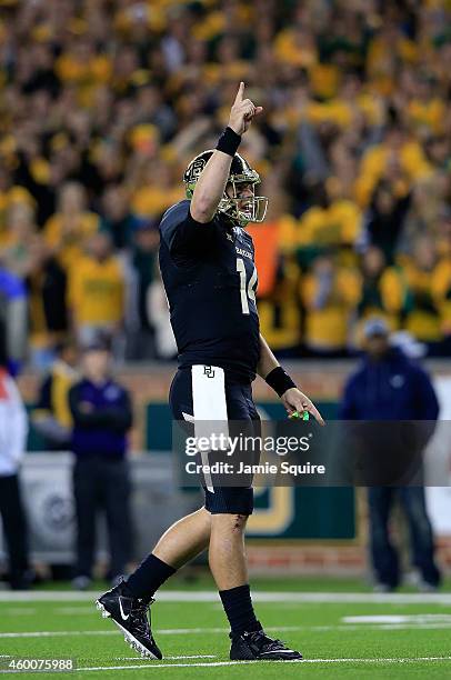 Bryce Petty of the Baylor Bears reacts after Baylor scored a touchdown against the Kansas State Wildcats during the first half of the game on...