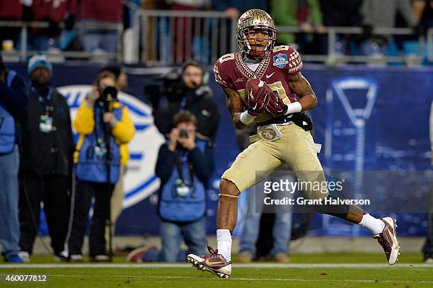 Rashad Greene of the Florida State Seminoles catches a touchdown pass against the Georgia Tech Yellow Jackets during the Atlantic Coast Conference...
