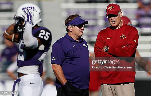 Head coaches Gary Patterson of the TCU Horned Frogs and Paul Rhoads of the Iowa State Cyclones talk before the Big 12 college football game at Amon...