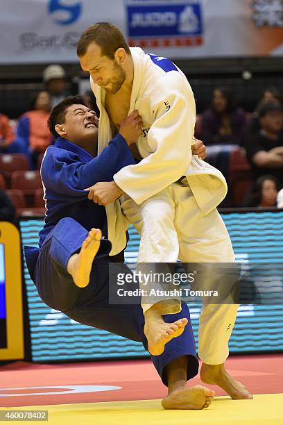Martin Pacek of Sweden and Jonghoon Won of Korea compete in Men's -100kg during Judo Grand Slam Tokyo 2014 at Tokyo Metropolitan Gymnasium on...