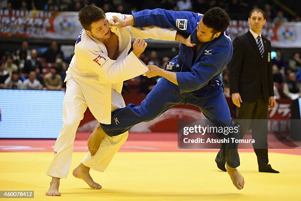 Kaihan Takagi of Japan and Benjamin Fletcher of Great Britain compete in Men's -100kg during Judo Grand Slam Tokyo 2014 at Tokyo Metropolitan...