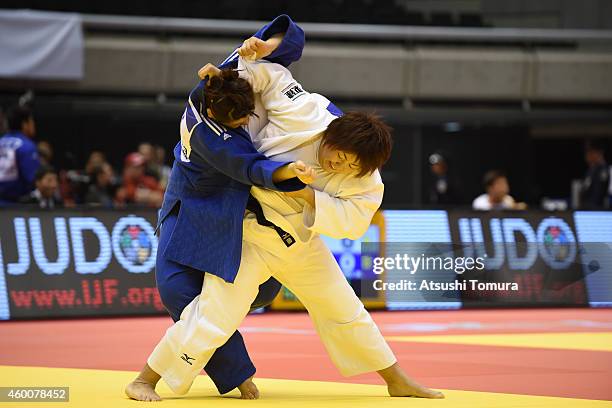 Kanae Yamabe of Japan and Jiyoun Kim of Korea compete in Women's +78kg during Judo Grand Slam Tokyo 2014 at Tokyo Metropolitan Gymnasium on December...