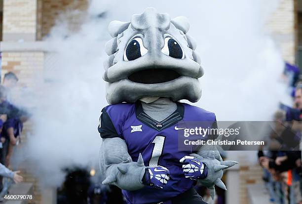 The TCU Horned Frogs mascot, "Super Frog" performs during the Big 12 college football game against the Iowa State Cyclones at Amon G. Carter Stadium...