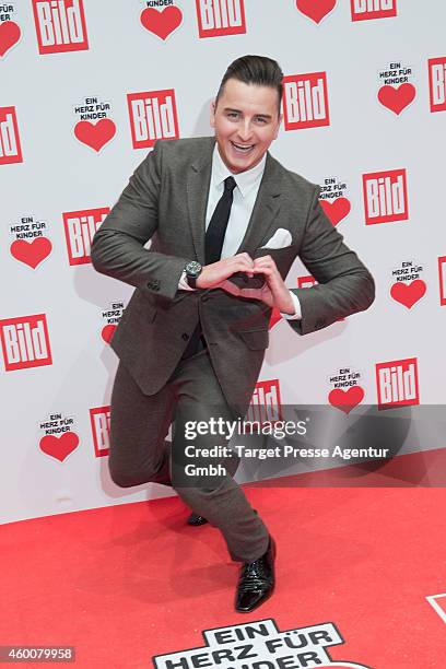 Andreas Gabalier attends the Ein Herz Fuer Kinder Gala 2014 at Tempelhof Airport on December 6, 2014 in Berlin, Germany.