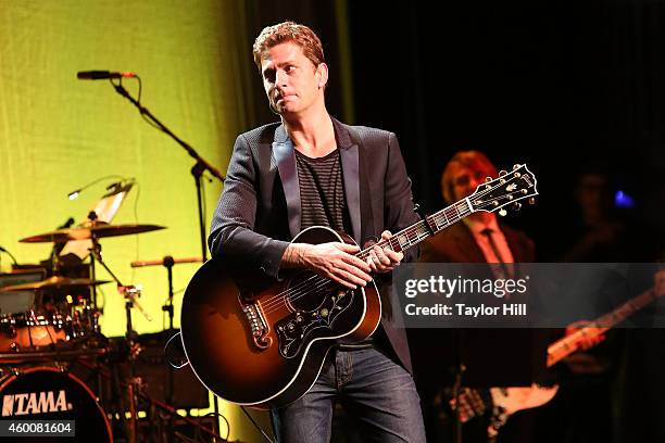 Rob Thomas of Matchbox 20 performs during Cyndi Lauper's 4th Annual "Home For The Holidays" Benefit Concert at Beacon Theatre on December 6, 2014 in...