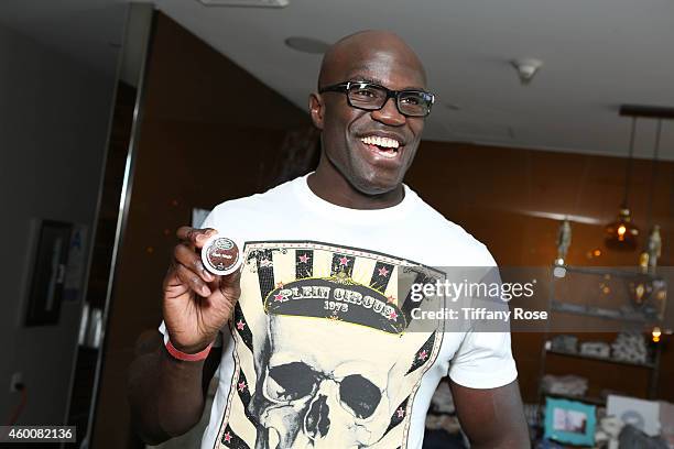 Mixed martial artist Cheick Kongo attends the 4th Annual Santa's Secret Workshop Benefiting LA Family Housing at Andaz Hotel on December 6, 2014 in...