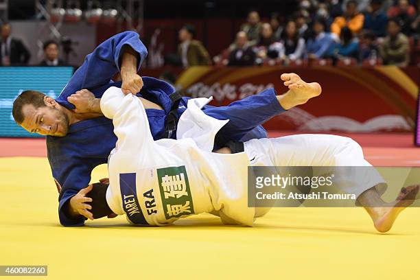 Cyrille Maret of France and Martin Pacek of Sweden compete in Men's -100kg semi final during Judo Grand Slam Tokyo 2014 at Tokyo Metropolitan...