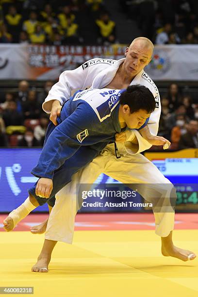 Henk Grol of Netherlands and Ryutaro Goto of Japan compete in Men's -100kg during Judo Grand Slam Tokyo 2014 at Tokyo Metropolitan Gymnasium on...