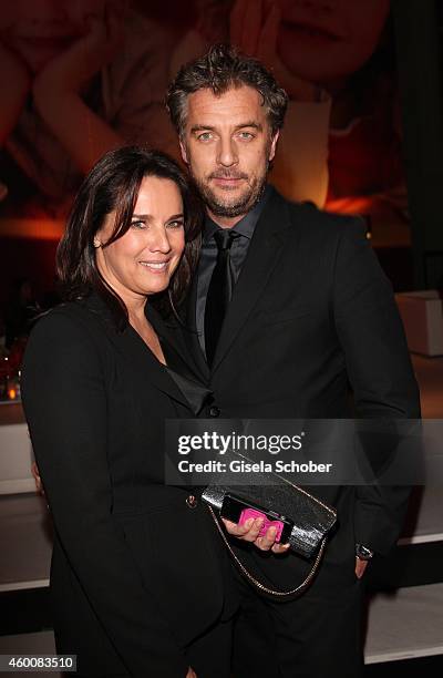 Desiree Nosbusch and her partner attend the Ein Herz fuer Kinder Gala 2014 after show party at Tempelhof Airport on December 6, 2014 in Berlin,...