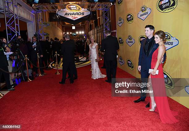 Denny Hamlin and his girlfriend Jordan Fish arrive at the 2014 NASCAR Sprint Cup Series Awards at Wynn Las Vegas on December 5, 2014 in Las Vegas,...
