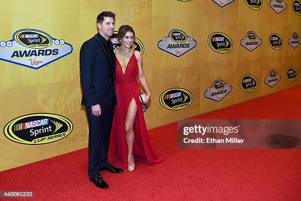 Denny Hamlin and his girlfriend Jordan Fish arrive at the 2014 NASCAR Sprint Cup Series Awards at Wynn Las Vegas on December 5, 2014 in Las Vegas,...