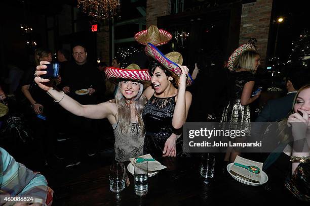 Bethany Watson and Sam Capolino attend Elvis Duran Z100 Morning Show Holiday Party at Anejo Tribeca on December 6, 2014 in New York City.