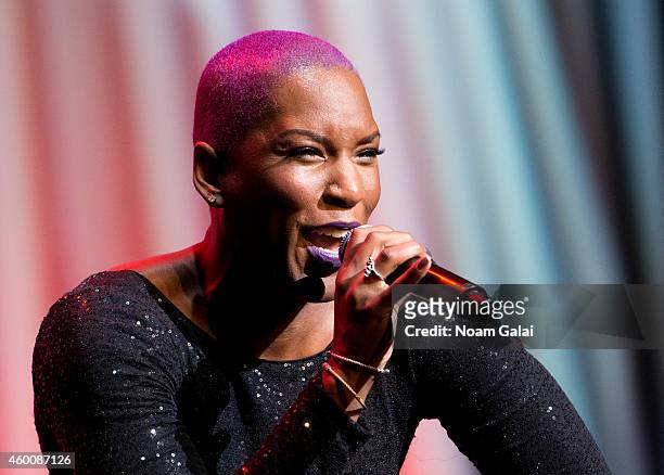 Liv Warfield performs during the 4th Annual "Home For The Holidays" Benefit Concert at Beacon Theatre on December 6, 2014 in New York City.