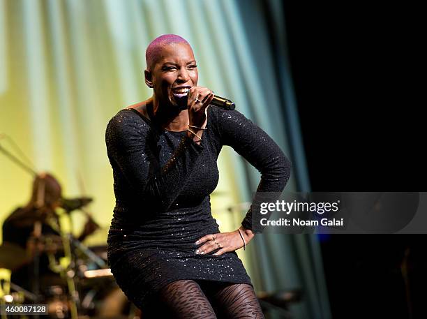 Liv Warfield performs during the 4th Annual "Home For The Holidays" Benefit Concert at Beacon Theatre on December 6, 2014 in New York City.