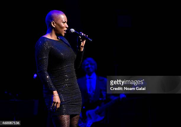 Liv Warfield performs during the 4th Annual "Home For The Holidays" Benefit Concert at Beacon Theatre on December 6, 2014 in New York City.