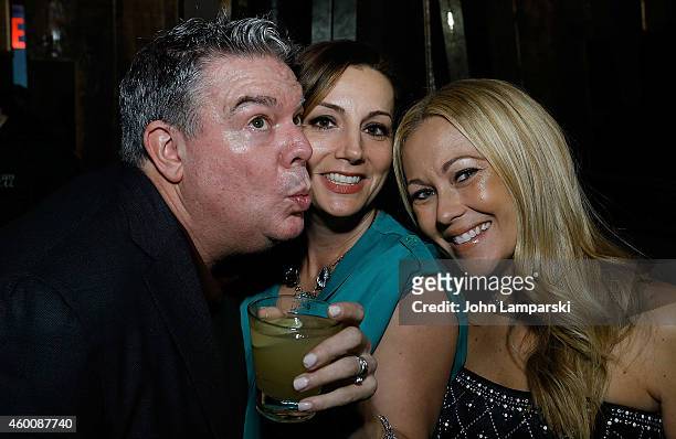 Elvis Duran , Danielle Monaro and guest attend Elvis Duran Z100 Morning Show Holiday Party at Anejo Tribeca on December 6, 2014 in New York City.