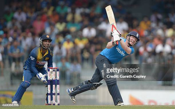 Eoin Morgan of England hits out for 6 runs during the 4th One Day International match between Sri Lanka and England at R. Premadasa Stadium on...