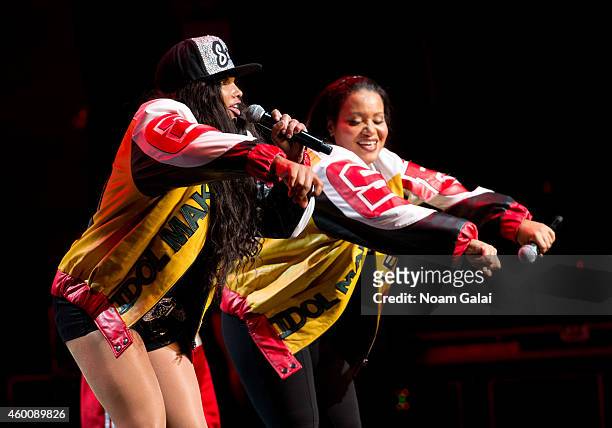 Salt-N-Pepa perform during the 4th Annual "Home For The Holidays" Benefit Concert at Beacon Theatre on December 6, 2014 in New York City.