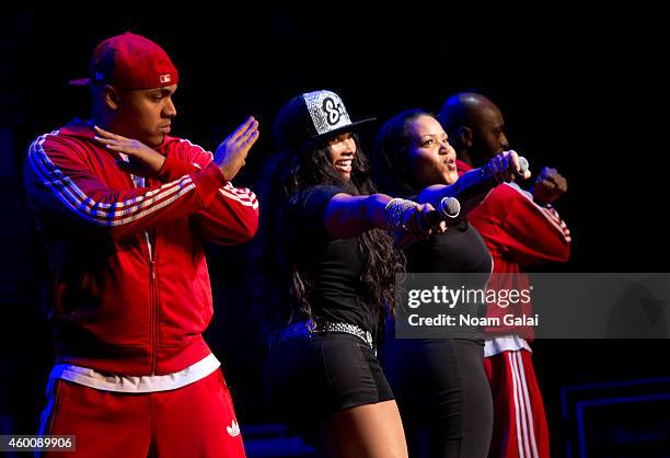 Salt-N-Pepa perform during the 4th Annual "Home For The Holidays" Benefit Concert at Beacon Theatre on December 6, 2014 in New York City.