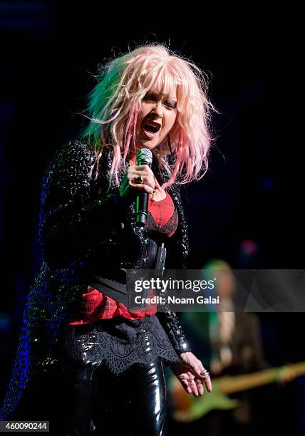 Cyndi Lauper performs during the 4th Annual "Home For The Holidays" Benefit Concert at Beacon Theatre on December 6, 2014 in New York City.