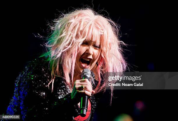 Cyndi Lauper performs during the 4th Annual "Home For The Holidays" Benefit Concert at Beacon Theatre on December 6, 2014 in New York City.