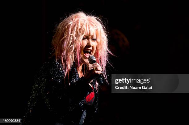 Cyndi Lauper performs during the 4th Annual "Home For The Holidays" Benefit Concert at Beacon Theatre on December 6, 2014 in New York City.