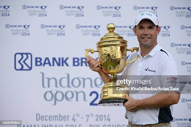 Padraig Harrington of Ireland poses with the trophy after winning during round four of the Indonesia Open at Damai Indah Golf, Pantai Indah Kapuk...
