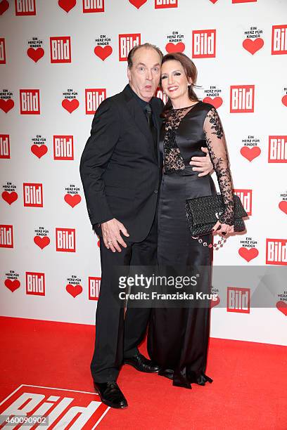 Herbert Knaup and Christiane Knaup attend the Ein Herz Fuer Kinder Gala 2014 - Red Carpet Arrivals on December 6, 2014 in Berlin, Germany.