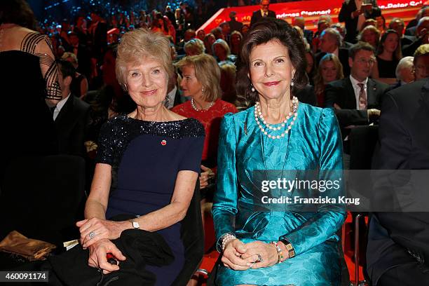 Friede Springer and Queen Silvia of Sweden attend the Ein Herz Fuer Kinder Gala 2014 - Red Carpet Arrivals on December 6, 2014 in Berlin, Germany.