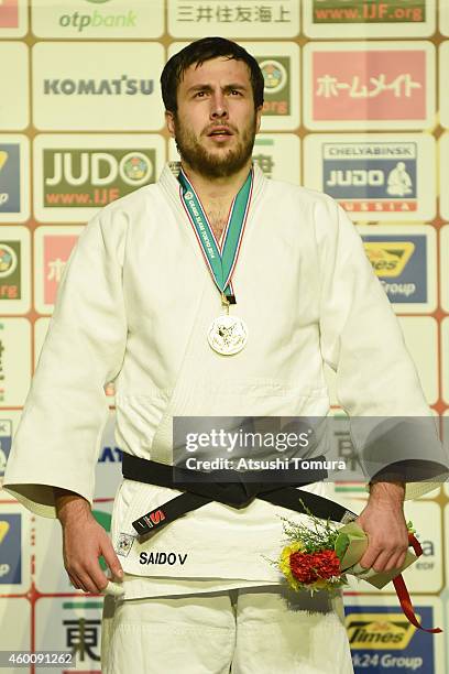 Renat Saidov of Russia poses with his gold medal in the victory ceremony for Men's +100kg during Judo Grand Slam Tokyo 2014 at Tokyo Metropolitan...