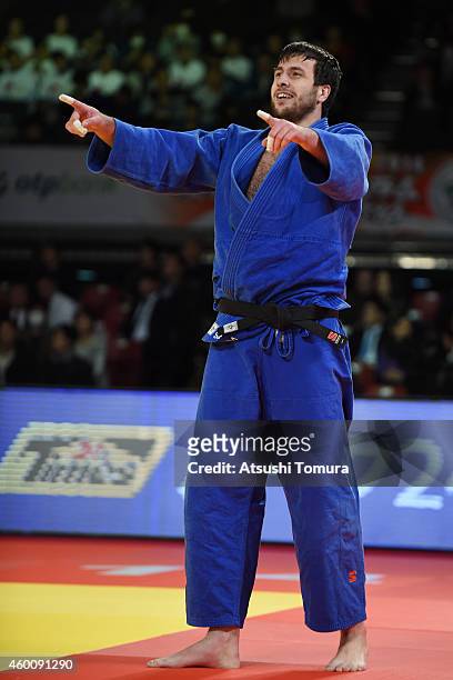 Renat Saidov of Russia celebrates after winning in Men's +100kg final against Levani Matiashvili of Georgea during Judo Grand Slam Tokyo 2014 at...