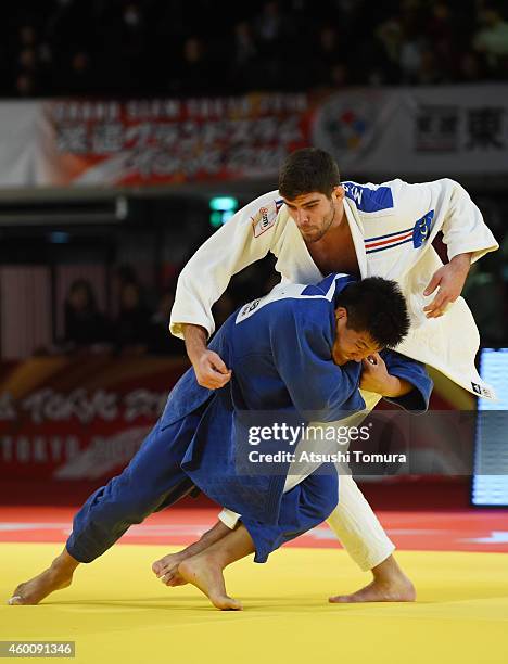 Cyrille Maret of France and Guham Cho of Korea compete in Men's -100kg final during Judo Grand Slam Tokyo 2014 at Tokyo Metropolitan Gymnasium on...