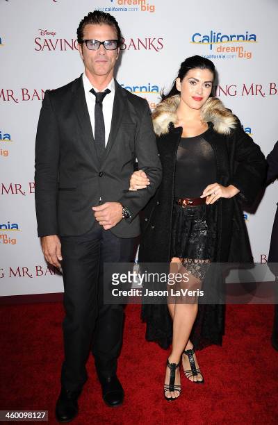 Actor Lorenzo Lamas and wife Shawna Craig attend the premiere of "Saving Mr. Banks" at Walt Disney Studios on December 9, 2013 in Burbank, California.