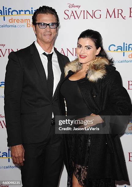 Actor Lorenzo Lamas and wife Shawna Craig attend the premiere of "Saving Mr. Banks" at Walt Disney Studios on December 9, 2013 in Burbank, California.