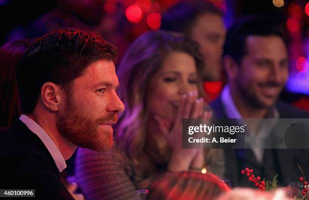 Xabi Alonso , Claudio Pizarro and his wife Karla Salcedo attend the FC Bayern Muenchen christmas party at Schuhbeck's Teatro restaurant on December...