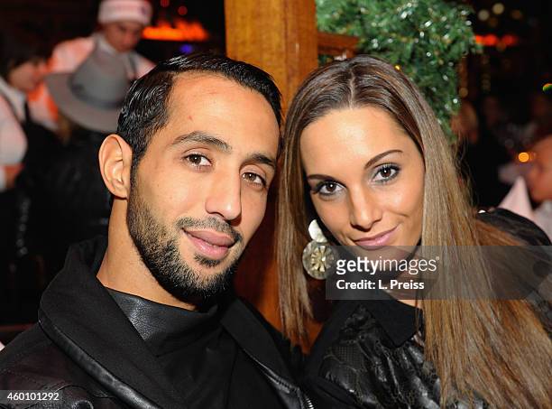 Medhi Benatia and his wife Cecile Benatia attend the FC Bayern Muenchen Christmas Party at Schubeck's Teatro restaurant on December 7, 2014 in...