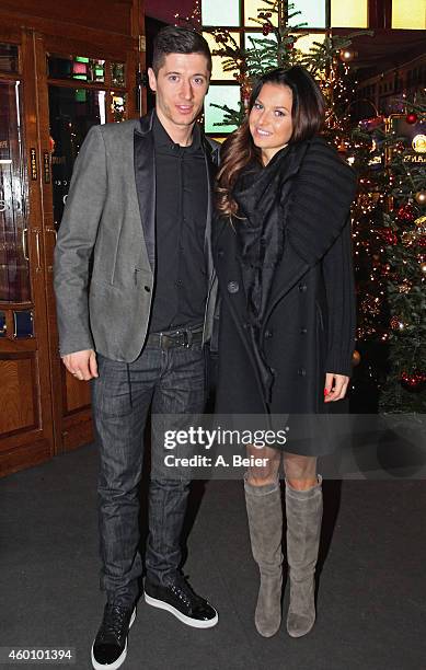 Robert Lewandowski and his wife Anna Stachurska attend the FC Bayern Muenchen Christmas Party at Schuhbeck's Teatro restaurant on December 7, 2014 in...